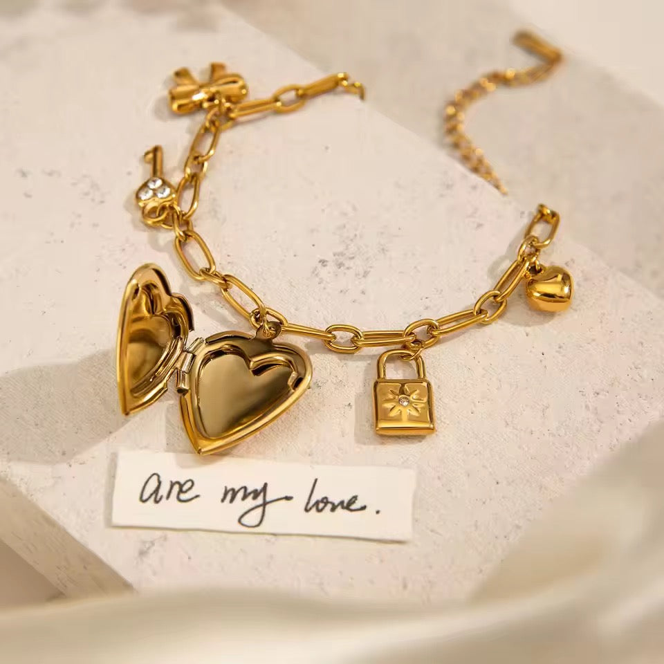 Aarina Charm Locket Bracelet Duo – Memories in Gold