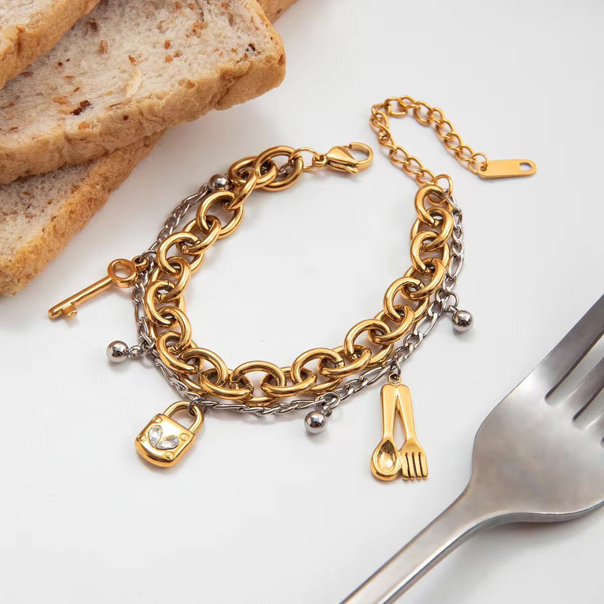 Mixed-Metal Charm Statement Bracelet