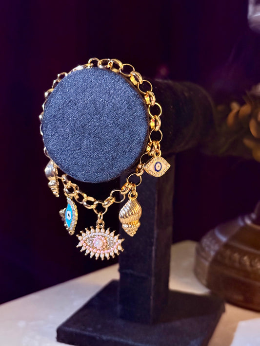 Elegant Gold Charm Bracelet with Evil Eye Protection