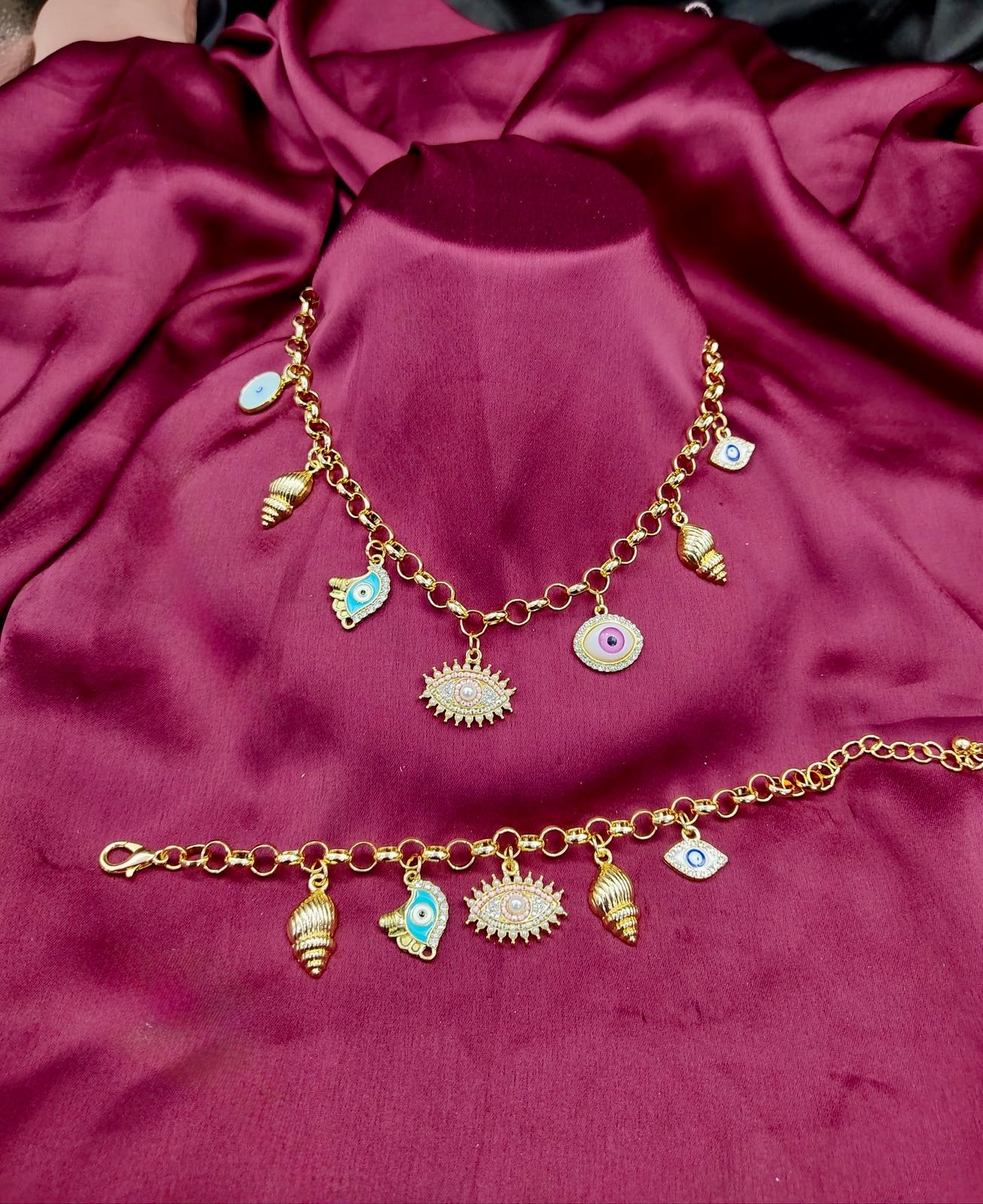 Elegant Gold Charm Bracelet with Evil Eye Protection