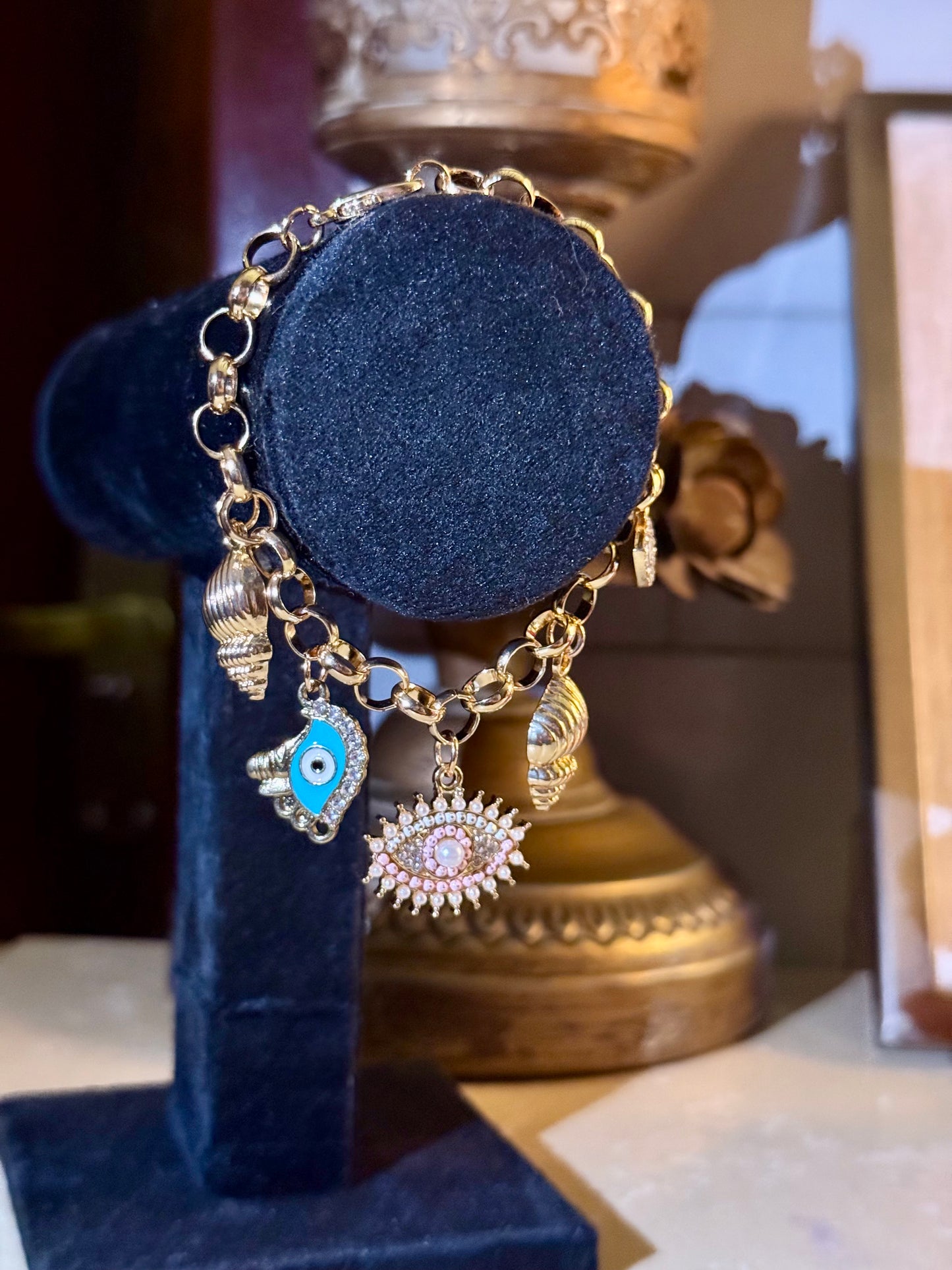 Elegant Gold Charm Bracelet with Evil Eye Protection